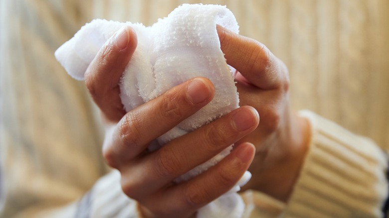 Hands washing with an oshibori