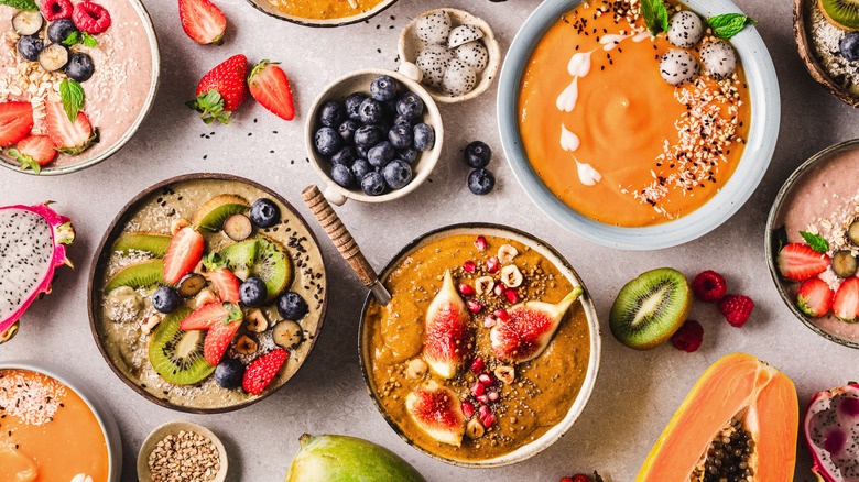 Array of colorful smoothie bowls 