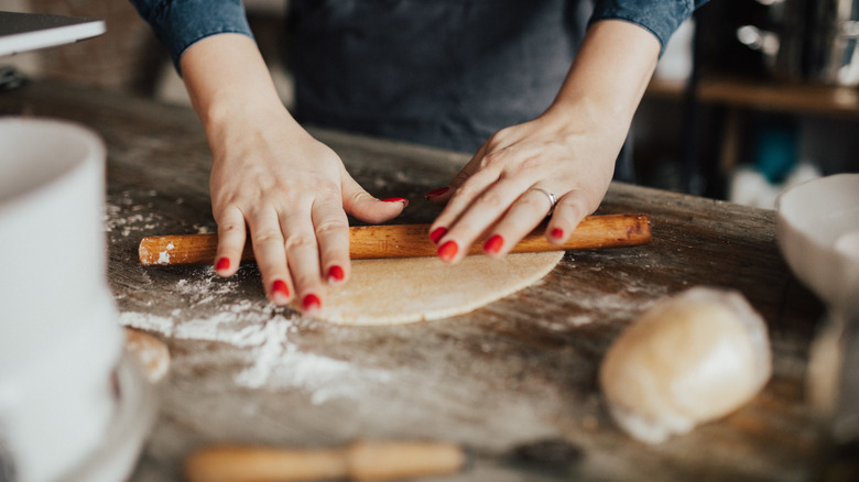 Rolling out pita bread dough