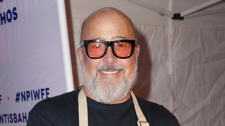 Andrew Zimmern wearing glasses