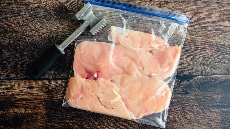 raw chicken in a zip seal bag