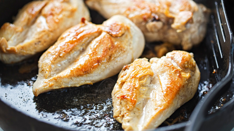 cooking chicken breast in pan