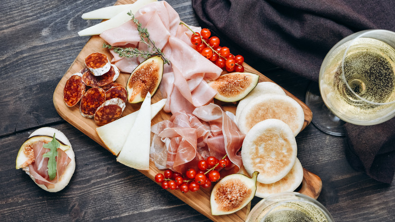 Charcuterie board on a gray background