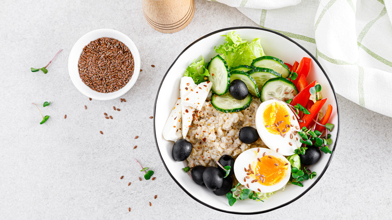 savory oatmeal topped with vegetables