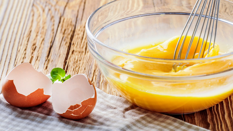 Whisking eggs in a bowl 