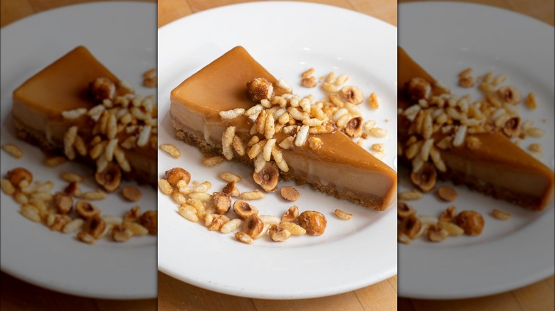 Caramelized white chocolate cheesecake on white plate