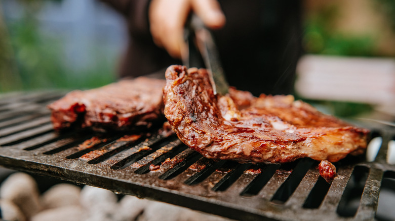 meat cooking on the grill