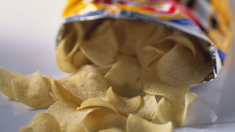 potato chips spilling out of bag