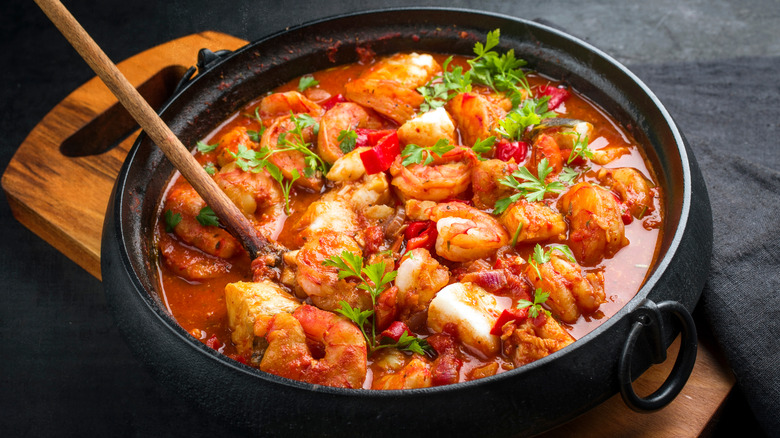 cioppino stew in cast iron pot