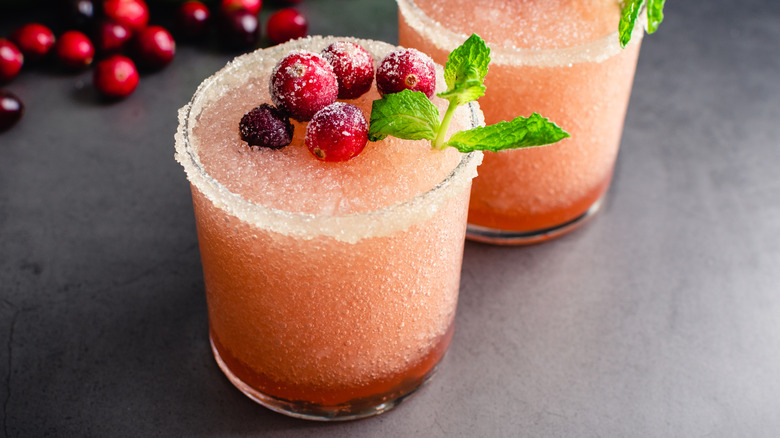 Frozen cranberry margaritas with salted rims