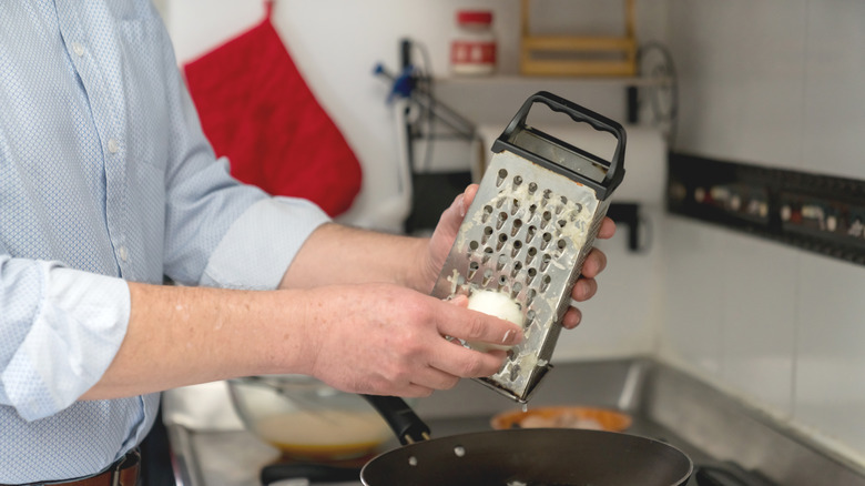 Hand grating onion