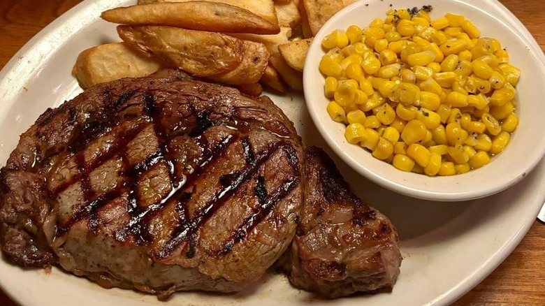 Texas Roadhouse steak with corn side