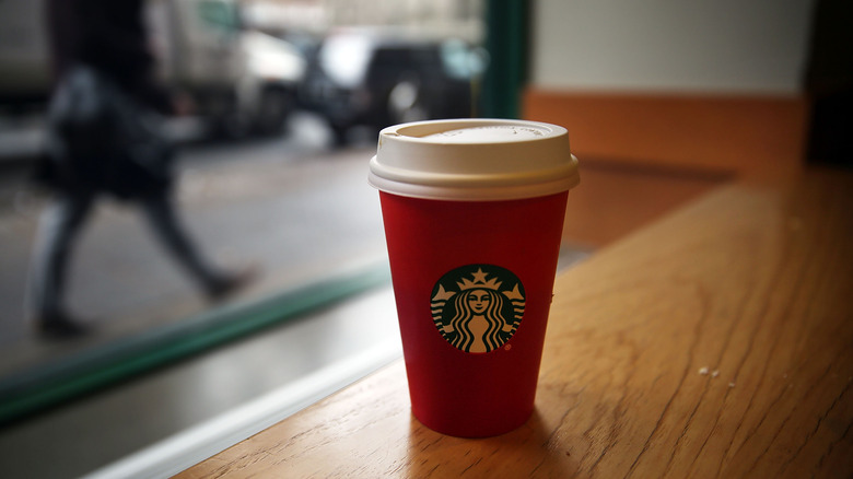 starbucks red cup on table