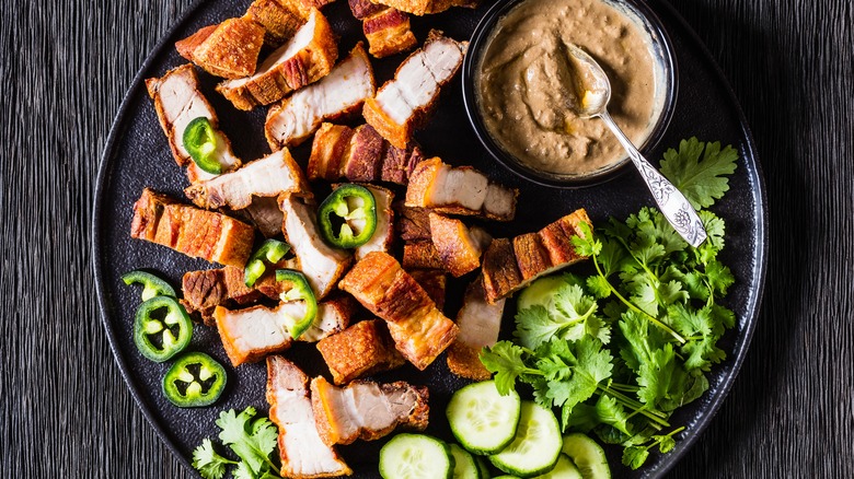 https://www.tastingtable.com/img/gallery/the-secret-to-crispy-and-flavorful-filipino-fried-pork-belly/intro-1697129234.jpg