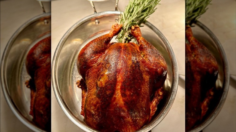 whole roast chicken stuffed with rosemary