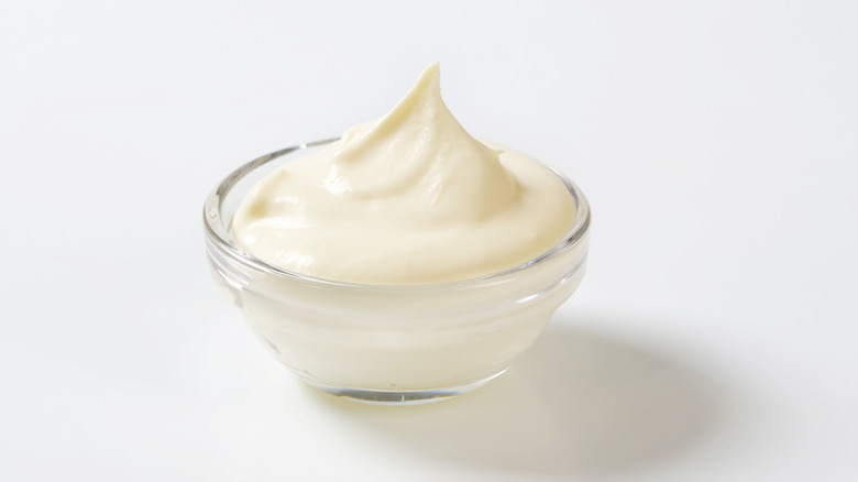 Sour cream in a glass bowl.