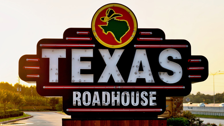 Texas Roadhouse sign on the freeway