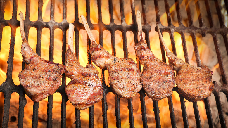 Lamb chops on grill grates 