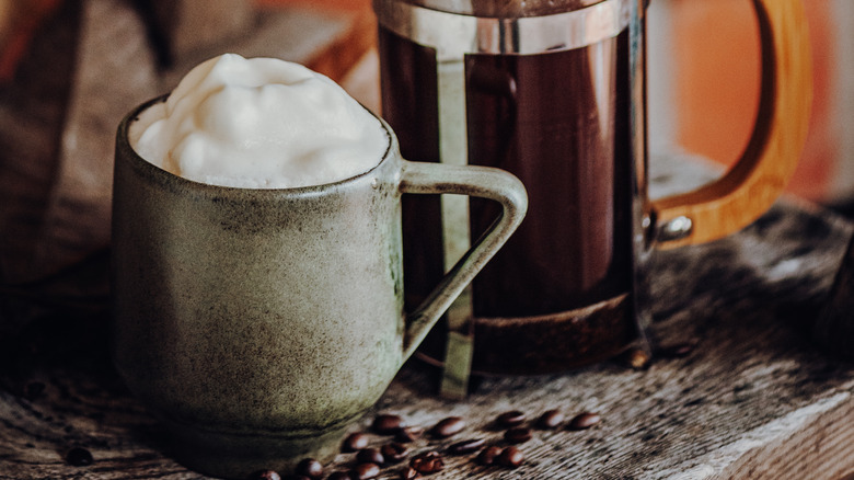 https://www.tastingtable.com/img/gallery/the-simple-gadgets-to-froth-milk-for-your-coffee-without-steam/intro-1690408454.jpg
