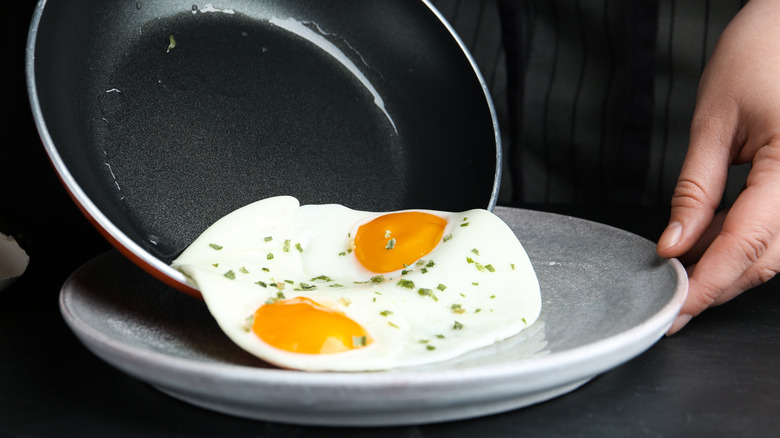 transferring eggs to plate