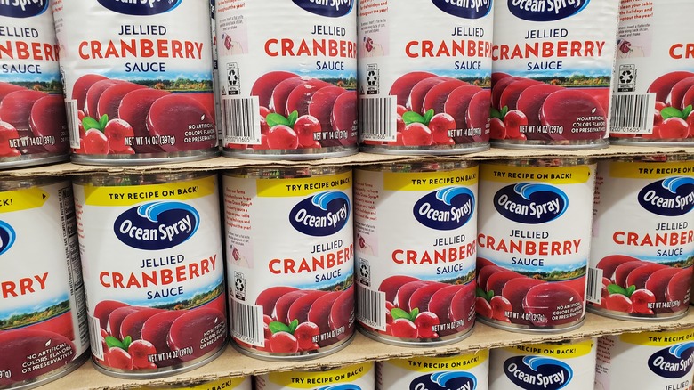 Canned cranberry sauce on grocery shelves