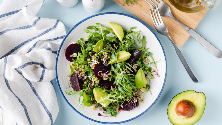 Beet, avocado, and arugula salad