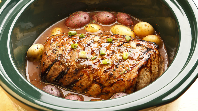 Roast beef in slow cooker with potatoes