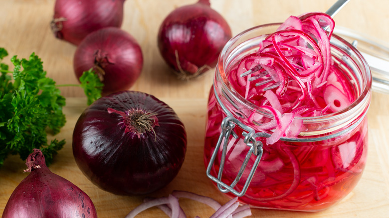 Pickled red onion in a jar