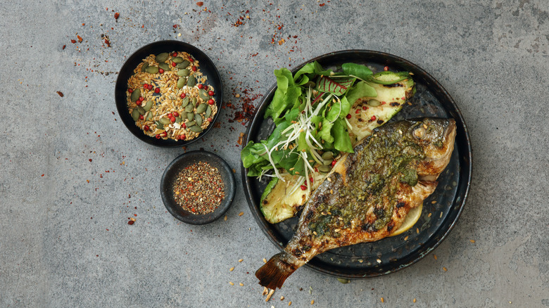 Grilled fish and a salad