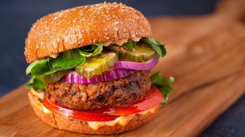 black bean burger on wooden cutting board