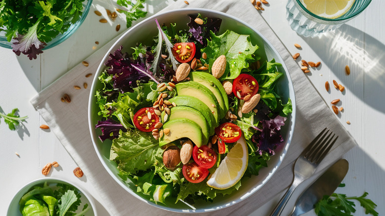 salad with sliced avocado and tomatoes