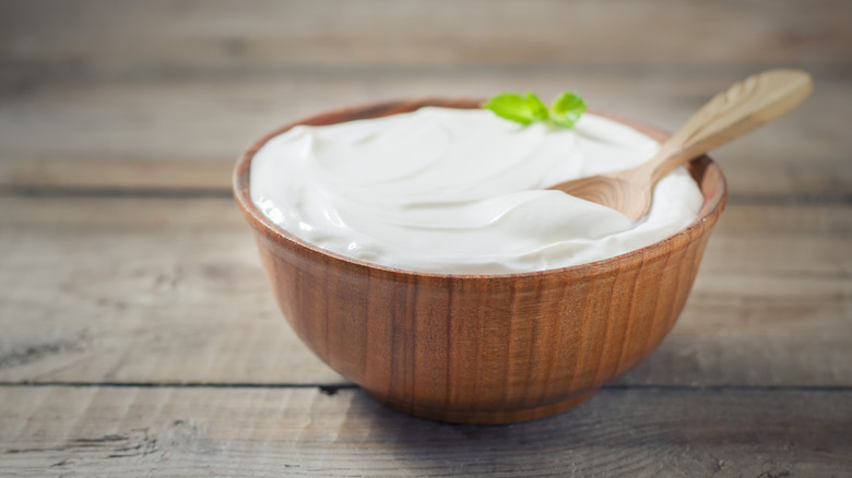 wood bowl of vanilla yogurt