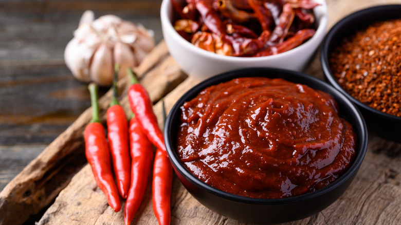 gochujang beside whole chilis