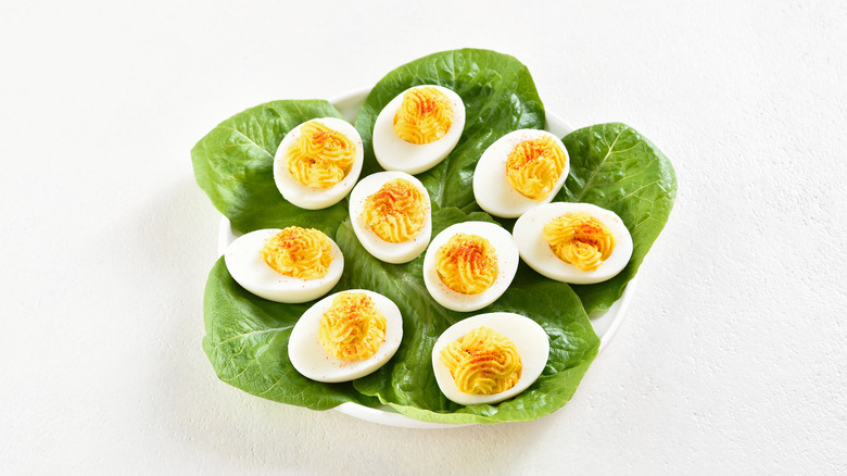 deviled eggs on butter lettuce