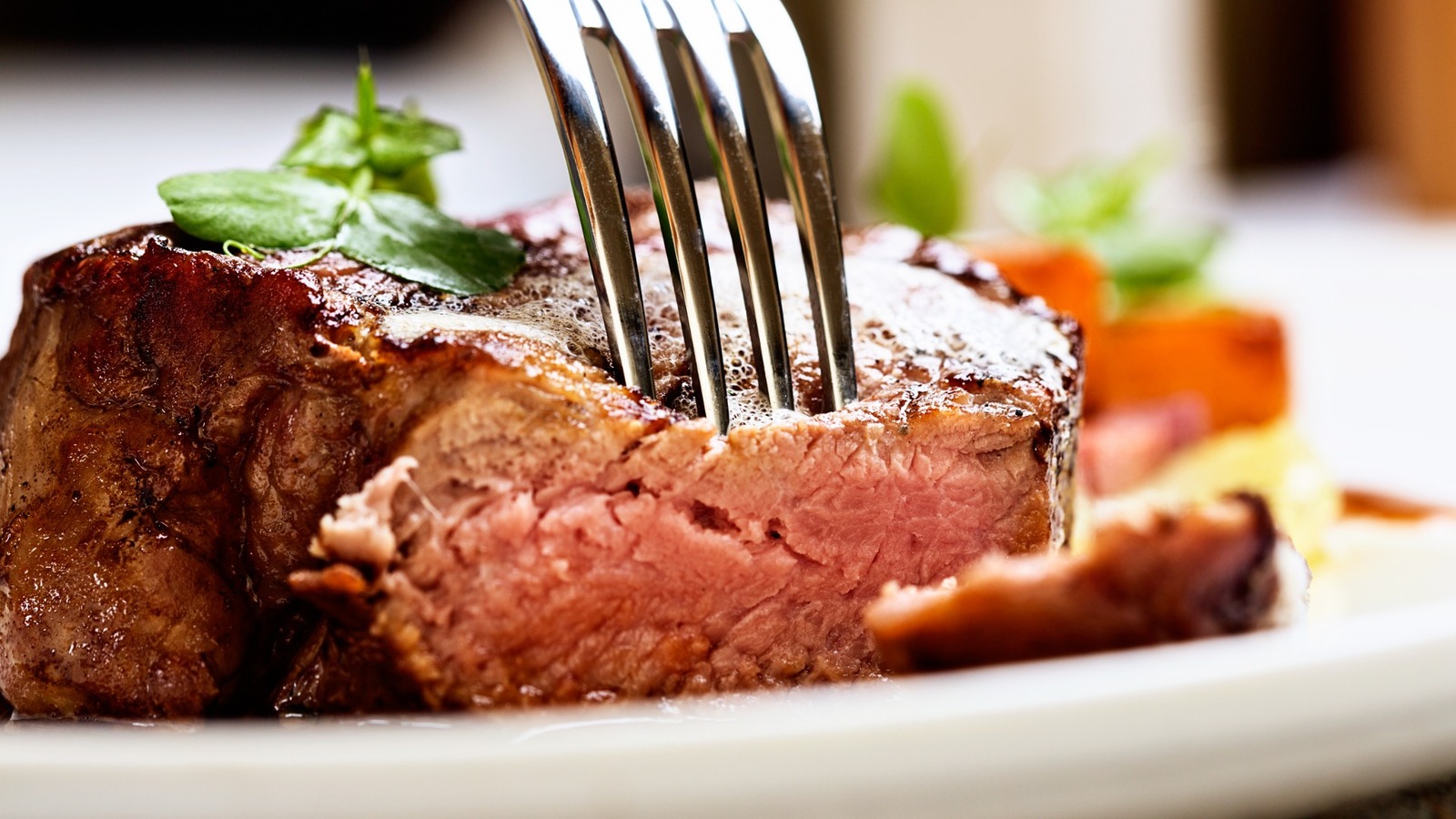 The Simple Way To Tenderize A Steak Using Nothing But A Fork