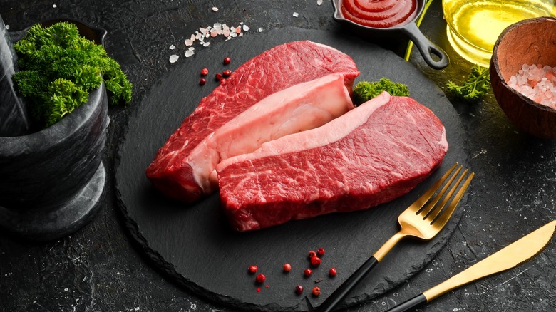 Cut of steak on black background