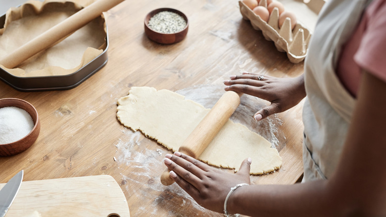 rolling out pie dough