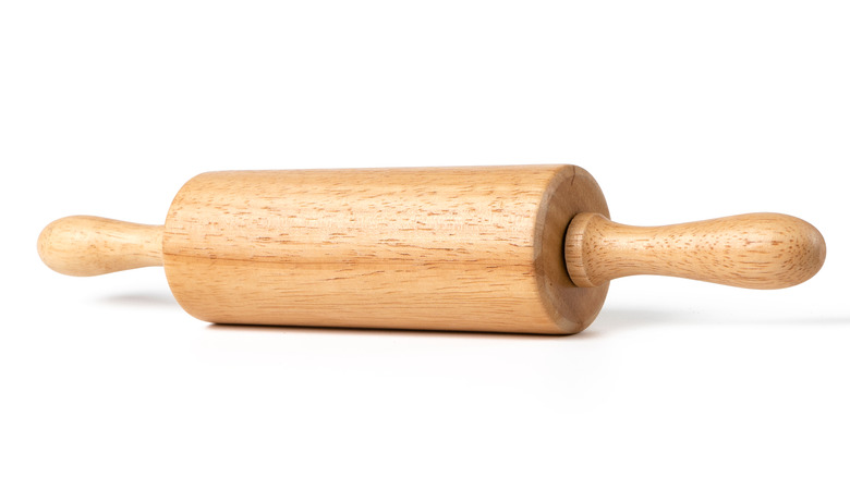 Rolling pin and white background