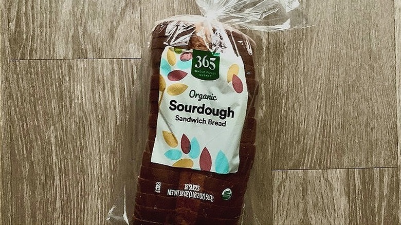 sourdough slices on wooden board