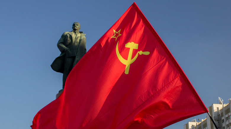Soviet flag and statue