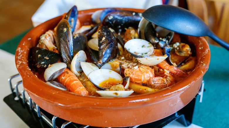 seafood in a cazuela on a table 