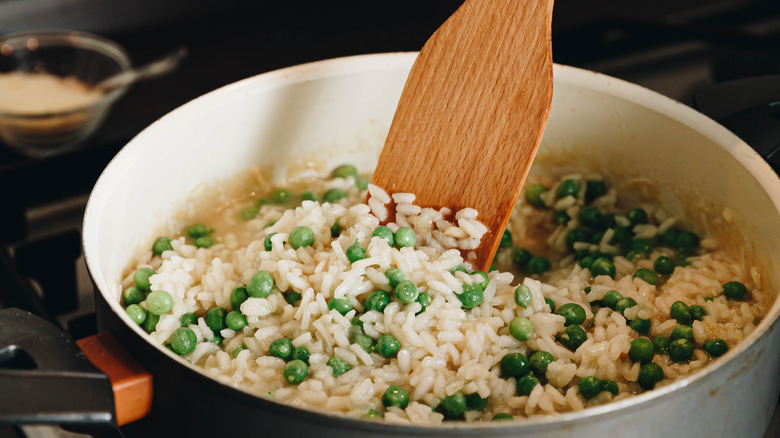 Cooking risotto with spatula 