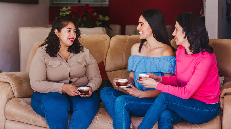 Women drinking Mexican cafe de olla 