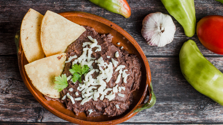 black refried beans with chips and cheese 