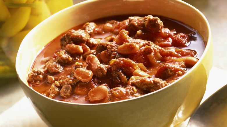 Canned chili in a yellow bowl