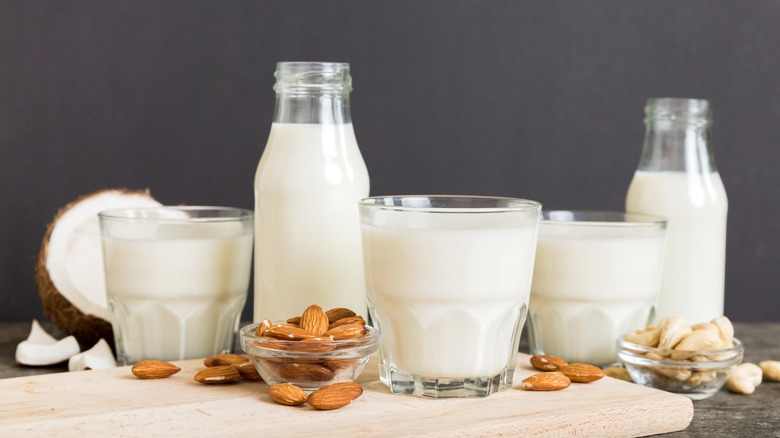 Various types of milk in glass containers