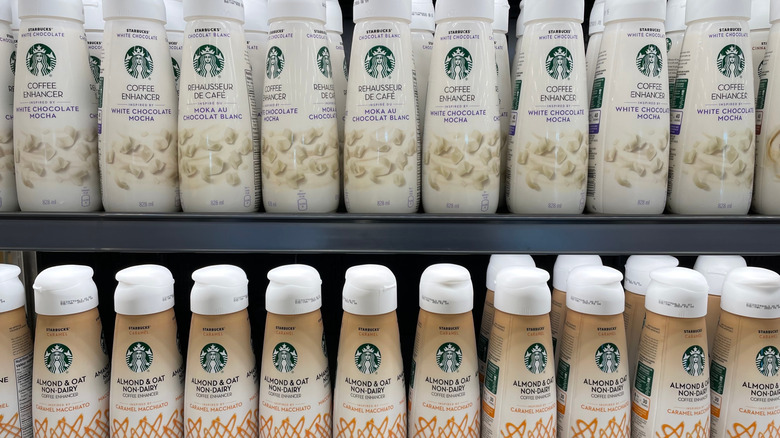 Bottles of Starbucks creamer at a grocery store