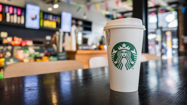 A coffee cup at a Starbucks cafe