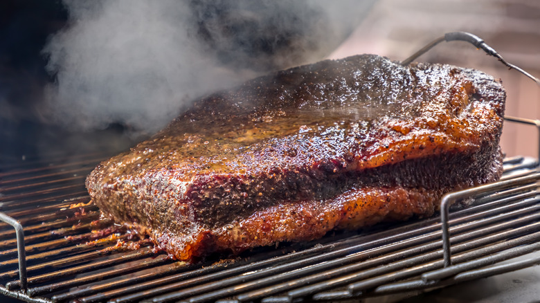 charred steak on grill