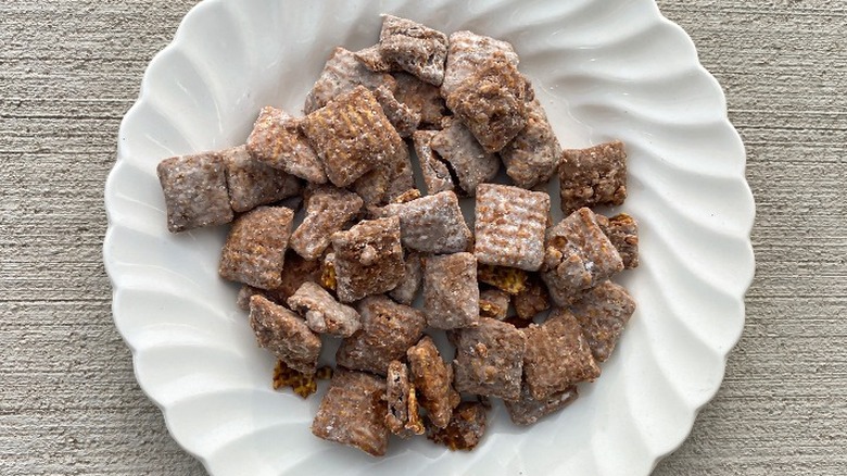 puppy chow in dish.